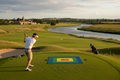 Golfer hitting approach to precise landing zone