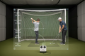 Golf coach using Trackman launch monitor with student